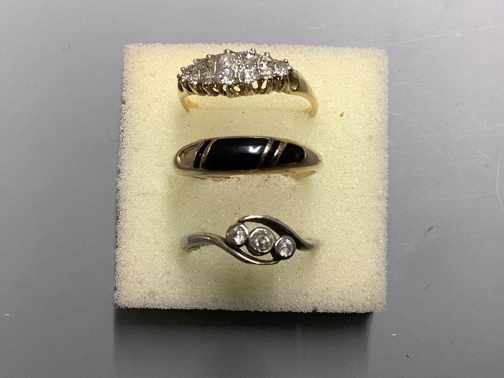 Two 18ct and diamond set rings, gross 5.7 grams and an enamelled ring (a.f.).